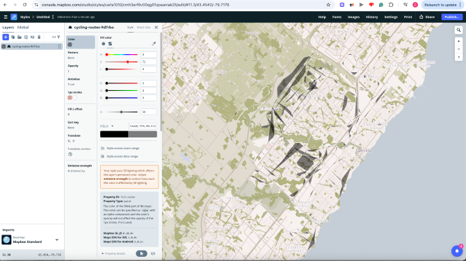 A topographic map displays cycling-infrastructure data combined with dramatic hillshade effects to emphasize elevation across suburban terrain.